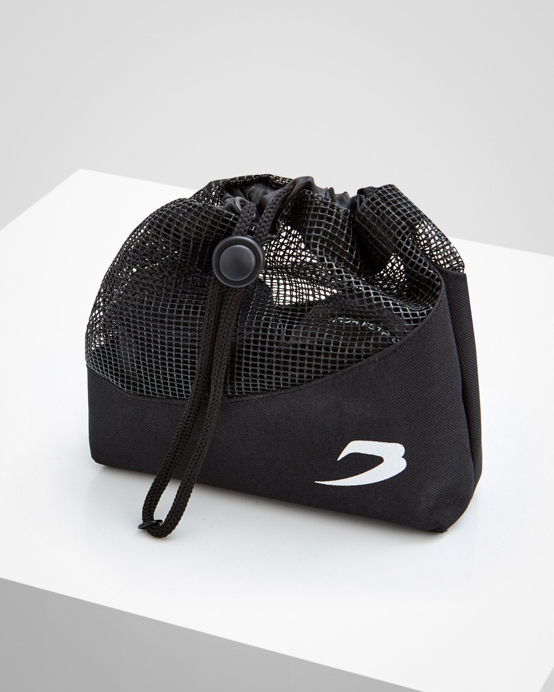 Black fabric boxing handwraps that is 4.5 metres in length with a leather velcro strap embossed with a white boxraw strike logo.