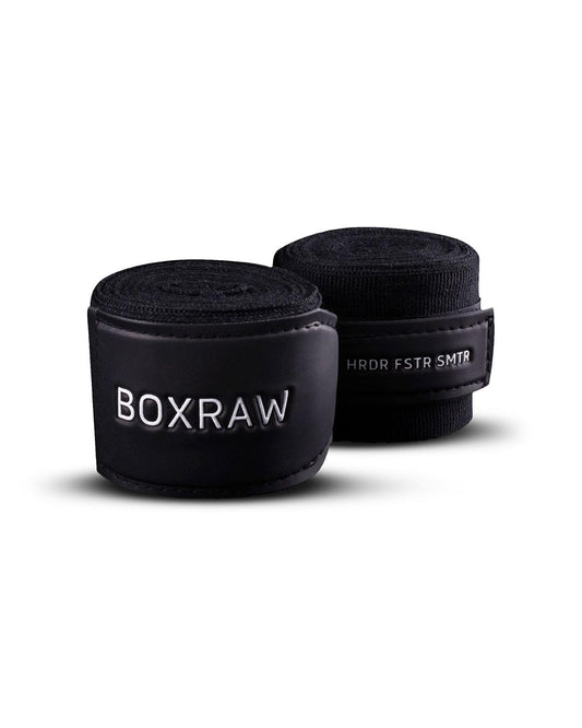 Black fabric boxing handwraps that is 4.5 metres in length with a leather velcro strap embossed with a white boxraw strike logo.
