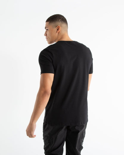 Man in tailored fit black t-shirt with embroidered boxraw strike logo made from stretch cotton.