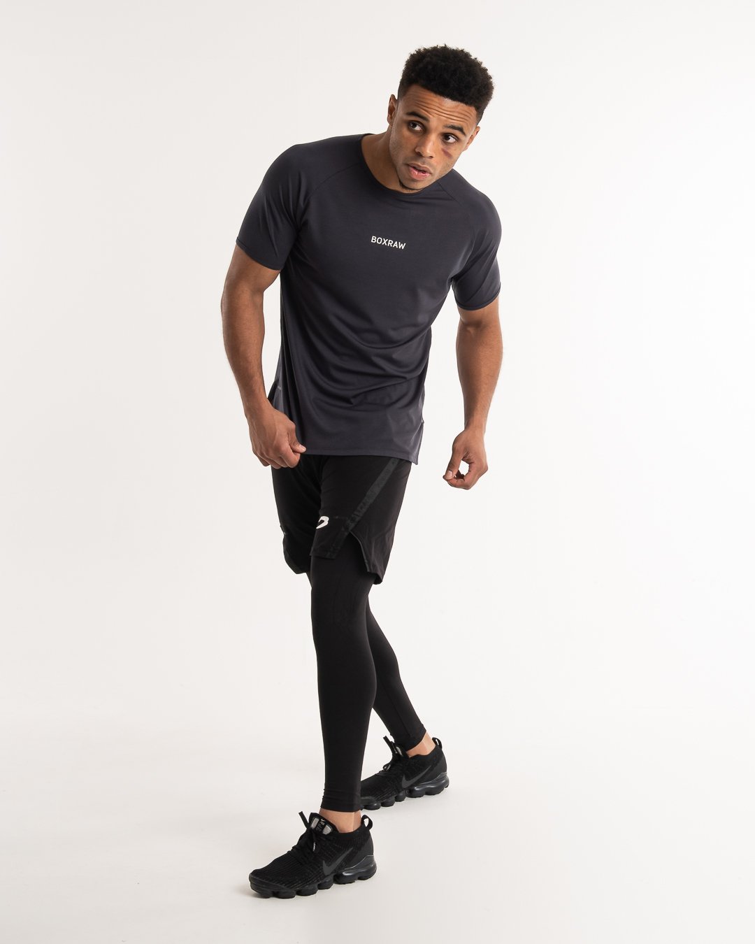 man wearing charcoal dark grey boxraw performance t-shirt tank top