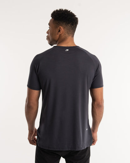 man wearing charcoal dark grey boxraw performance t-shirt tank top