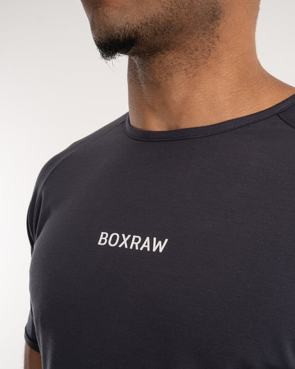 man wearing charcoal dark grey boxraw performance t-shirt tank top