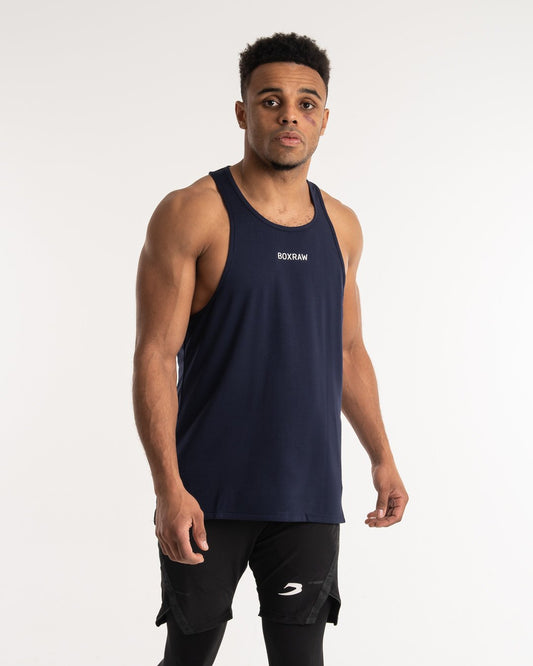 man wearing navy dark grey boxraw performance stringer tank top