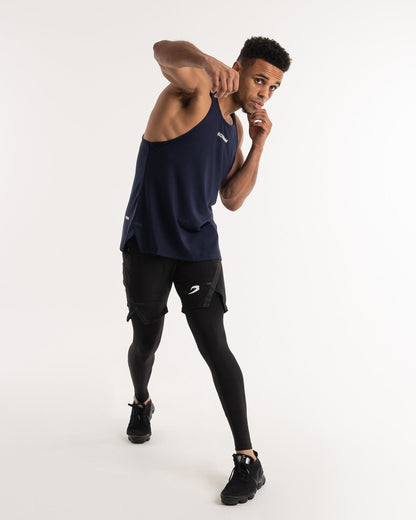man wearing navy dark grey boxraw performance stringer tank top