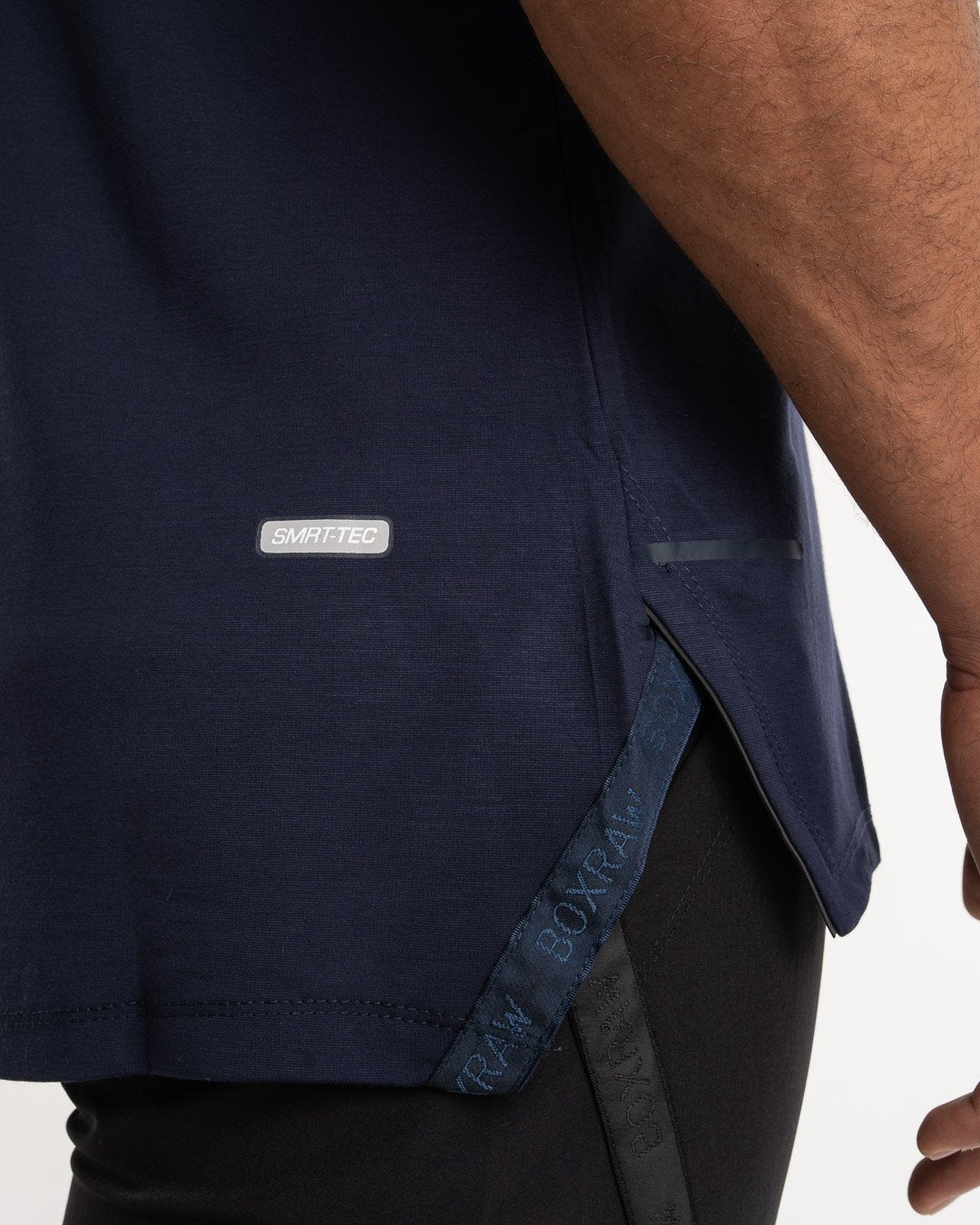 man wearing navy dark grey boxraw performance stringer tank top
