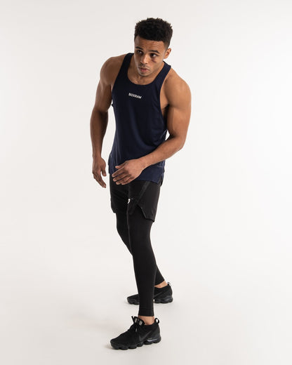 man wearing navy dark grey boxraw performance stringer tank top