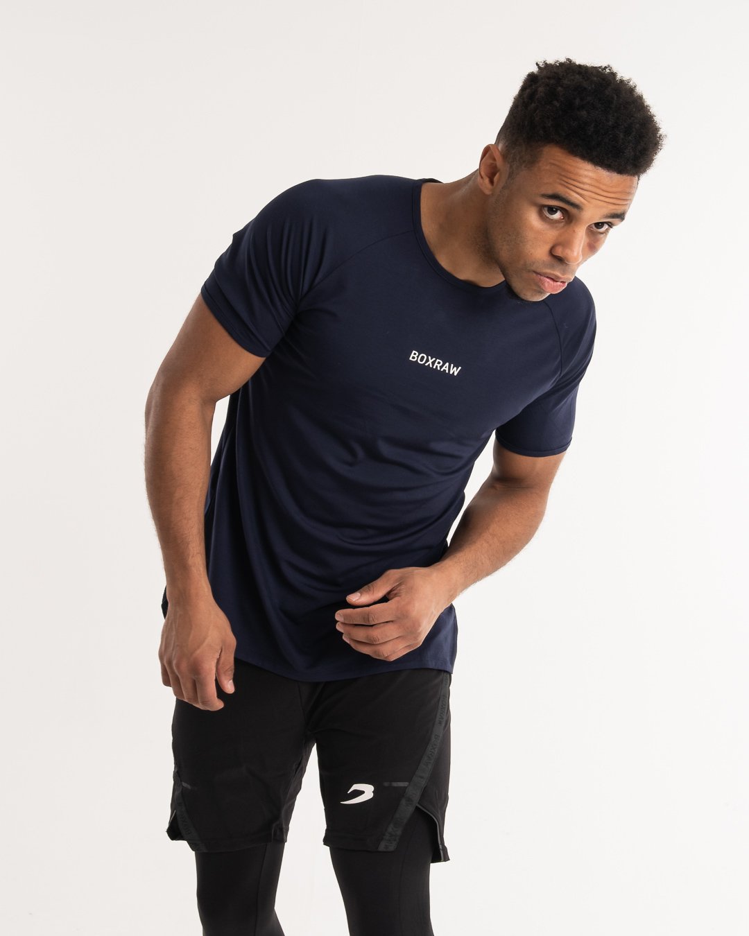 man wearing navy dark grey boxraw performance t-shirt tank top