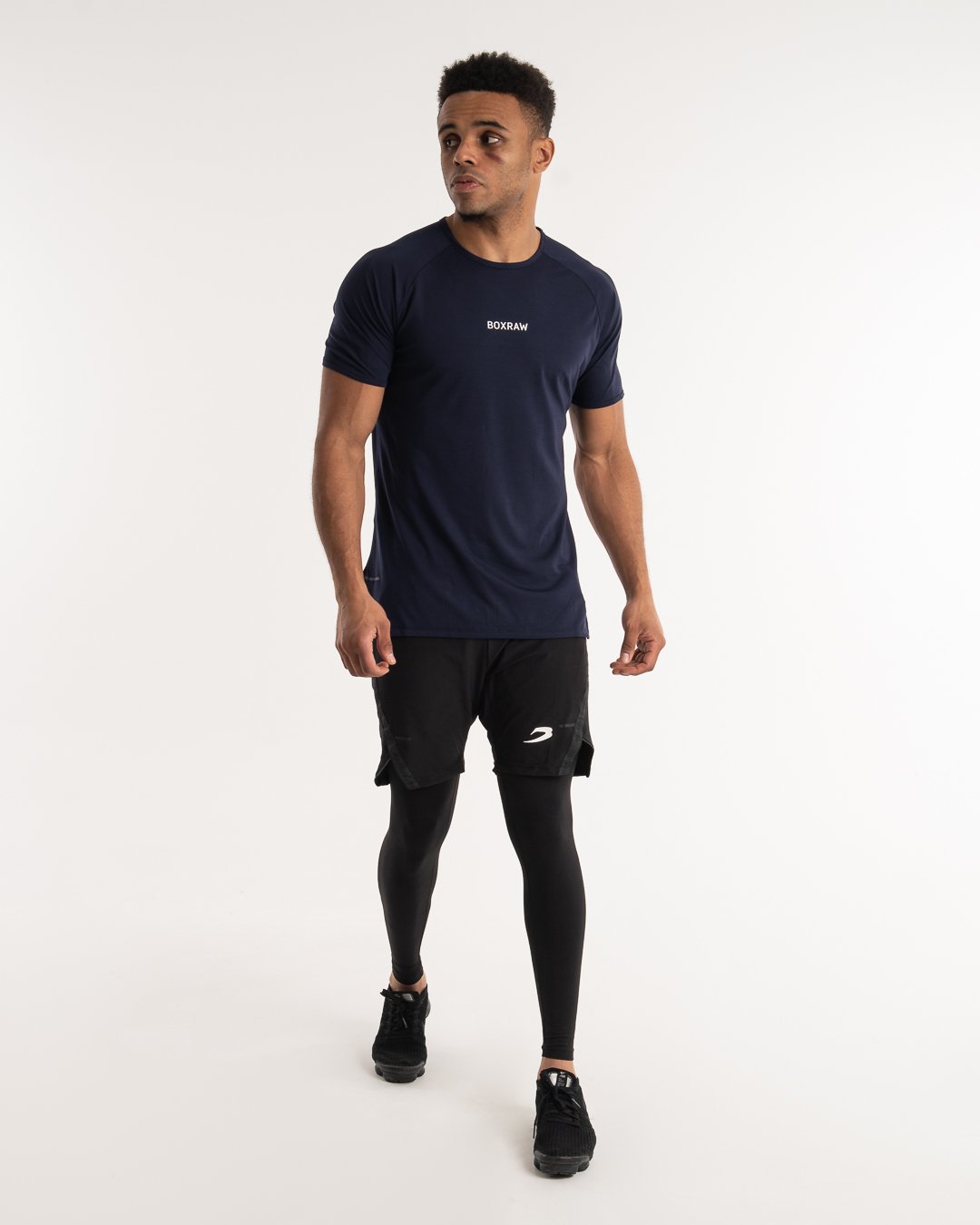 man wearing navy dark grey boxraw performance t-shirt tank top