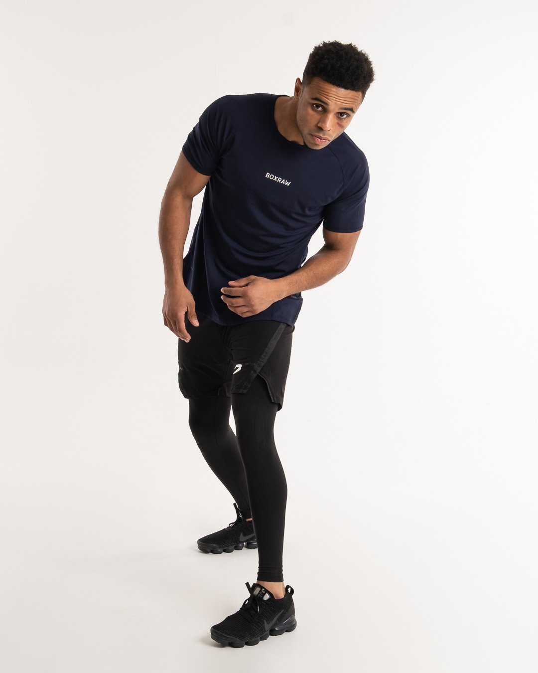 man wearing navy dark grey boxraw performance t-shirt tank top