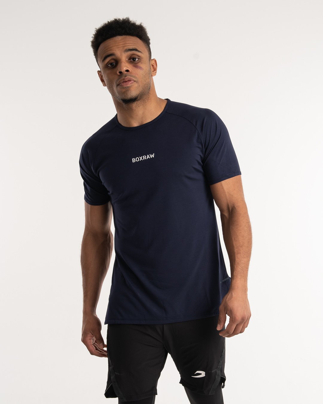 man wearing navy dark grey boxraw performance t-shirt tank top