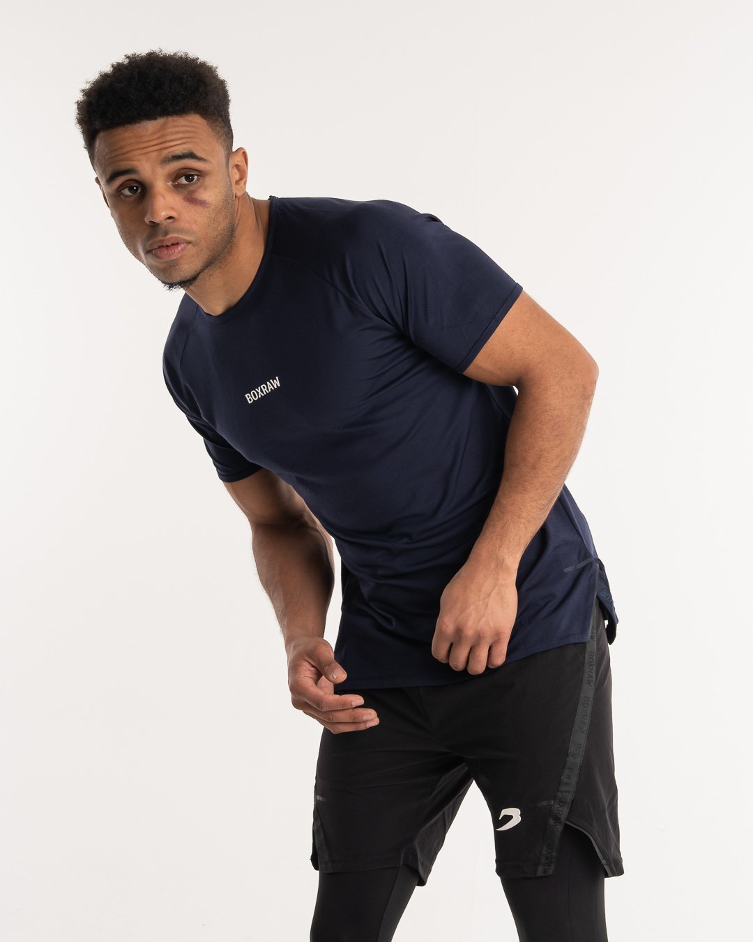 man wearing navy dark grey boxraw performance t-shirt tank top