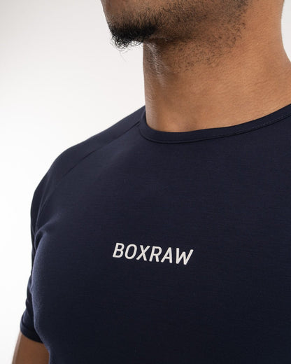 man wearing navy dark grey boxraw performance t-shirt tank top